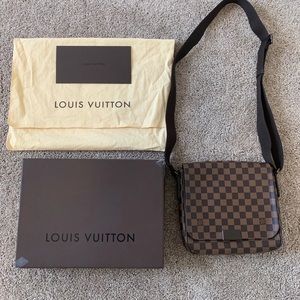 Louis Vuitton messenger bag for men or women.